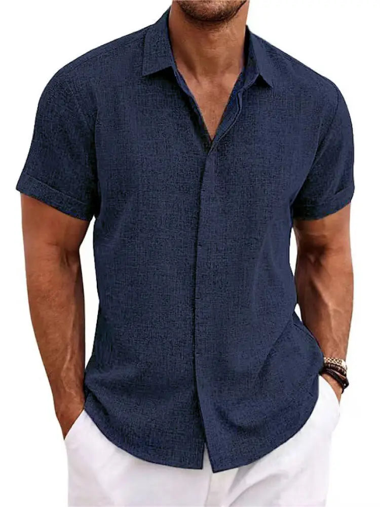 Navy blue men’s relaxed fit solid linen short sleeve shirt with subtle textured weave and button-up front