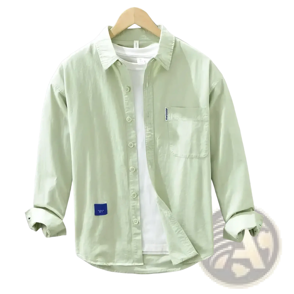 Men’s solid light green long sleeve casual button-up shirt with chest pocket and rolled cuffs