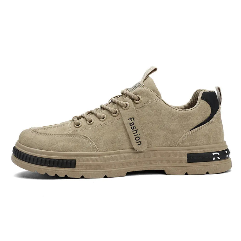Beige suede luxury men’s rugged platform sneaker with black accents and a chunky sole for breathable sport use