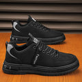 Black canvas luxury men’s rugged platform sneakers with gray accents and breathable sport design featuring fashion branding