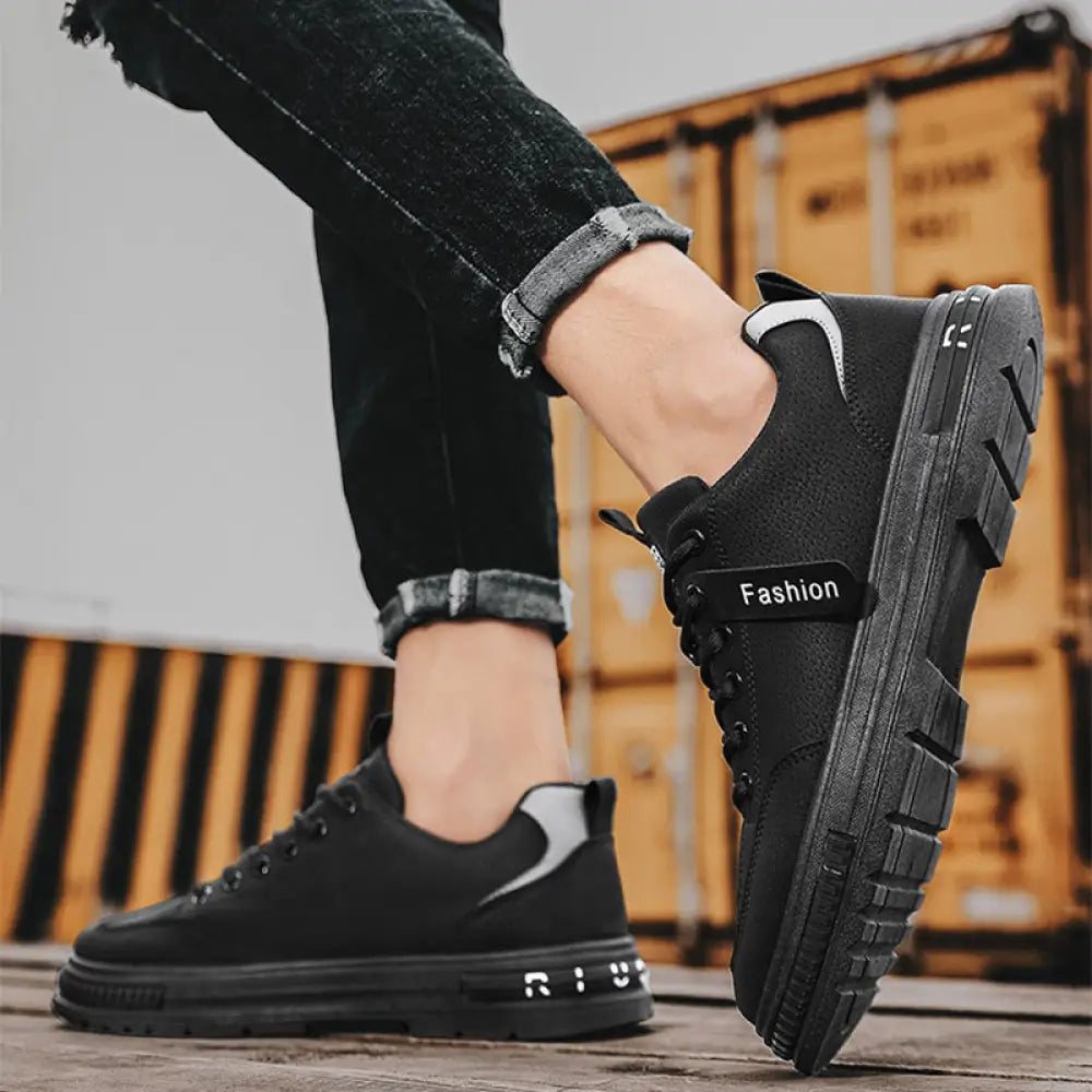 Black canvas luxury men’s rugged platform sneakers with white accents and breathable sport design featuring fashion branding