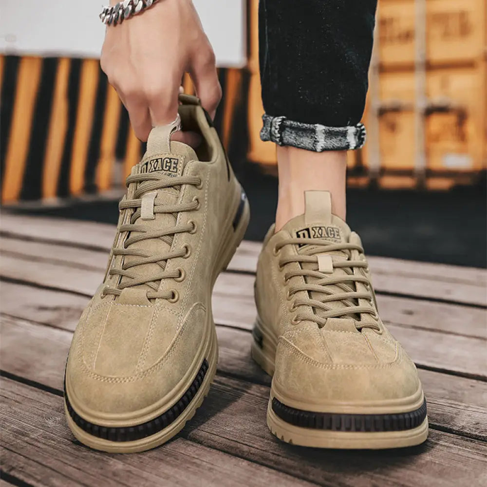 Beige suede luxury men’s rugged platform sneakers with black rubber soles and xxce logo on the tongue