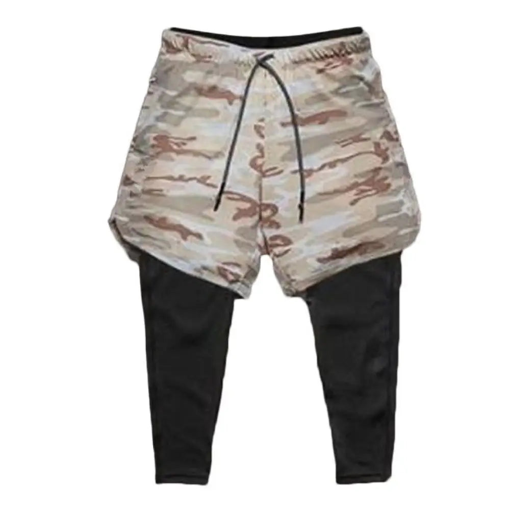 Men’s camouflage quick dry 2-in-1 training shorts beige and brown with black elastic waistband over black leggings