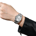 Men’s stainless steel quartz wristwatch in silver tone with diamond-studded bezel and classic dial design