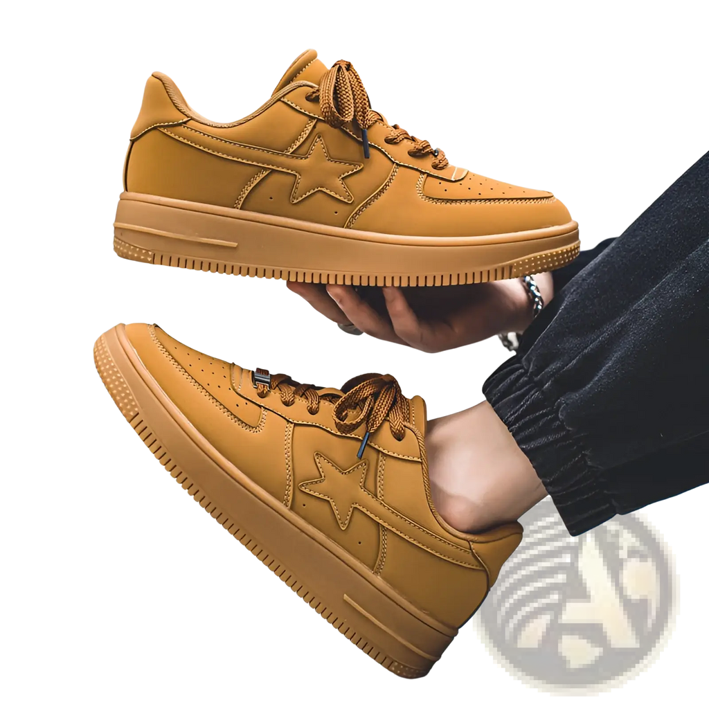 Men’s tan suede leather sneakers with star emblem, matching laces, and thick sole for casual wear