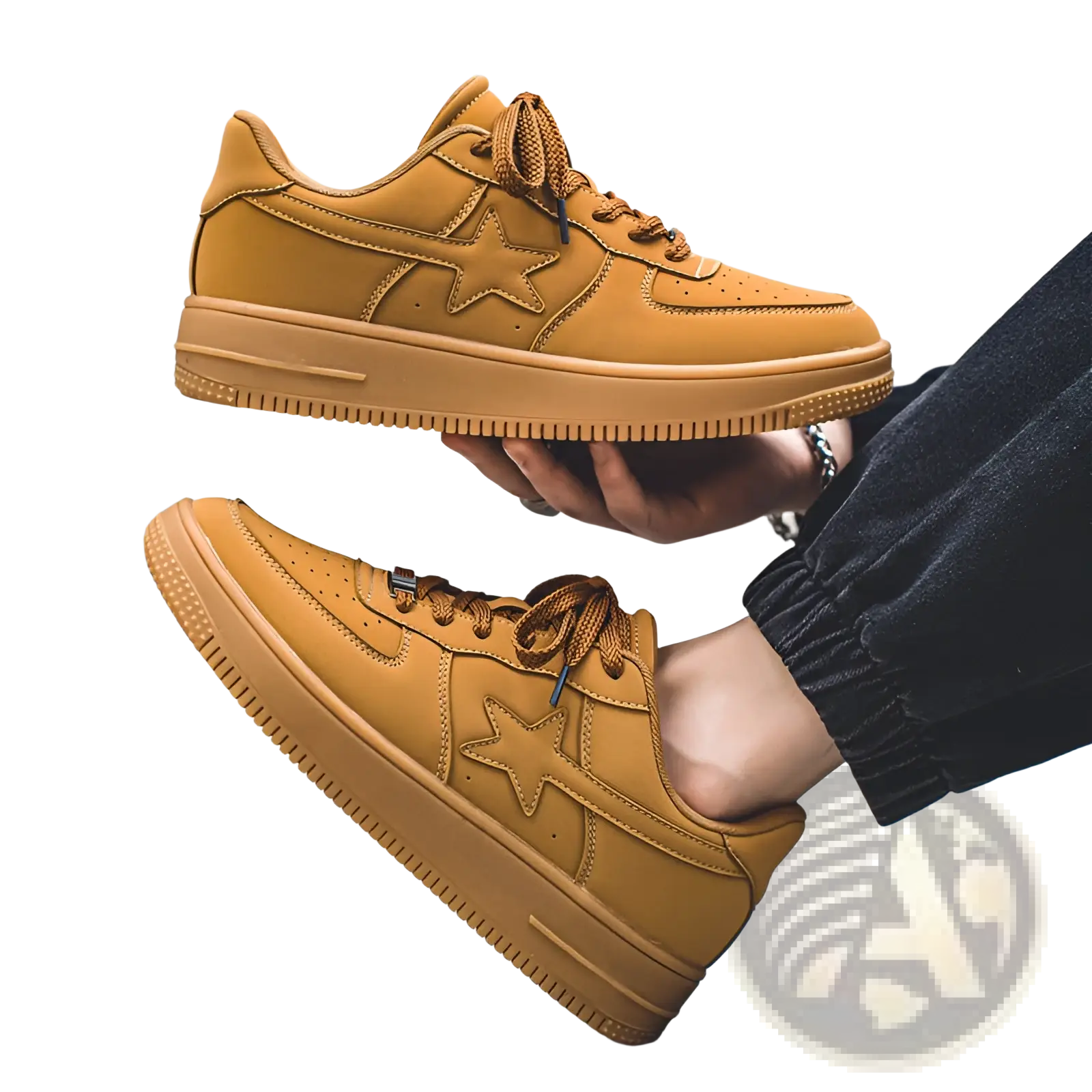 Men’s tan suede leather sneakers with star emblem, matching laces, and thick sole for casual wear
