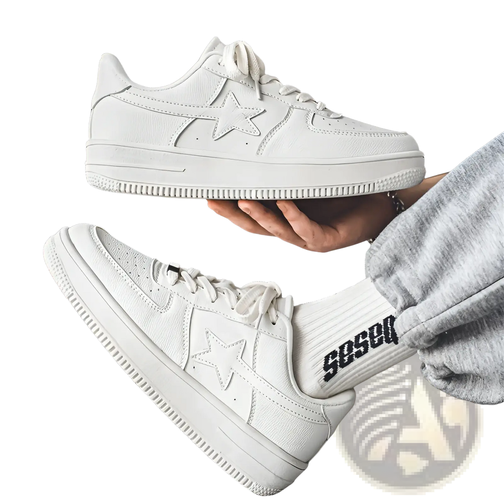 Men’s white suede leather sneakers with star emblem, low-top design, thick sole, and matching white laces
