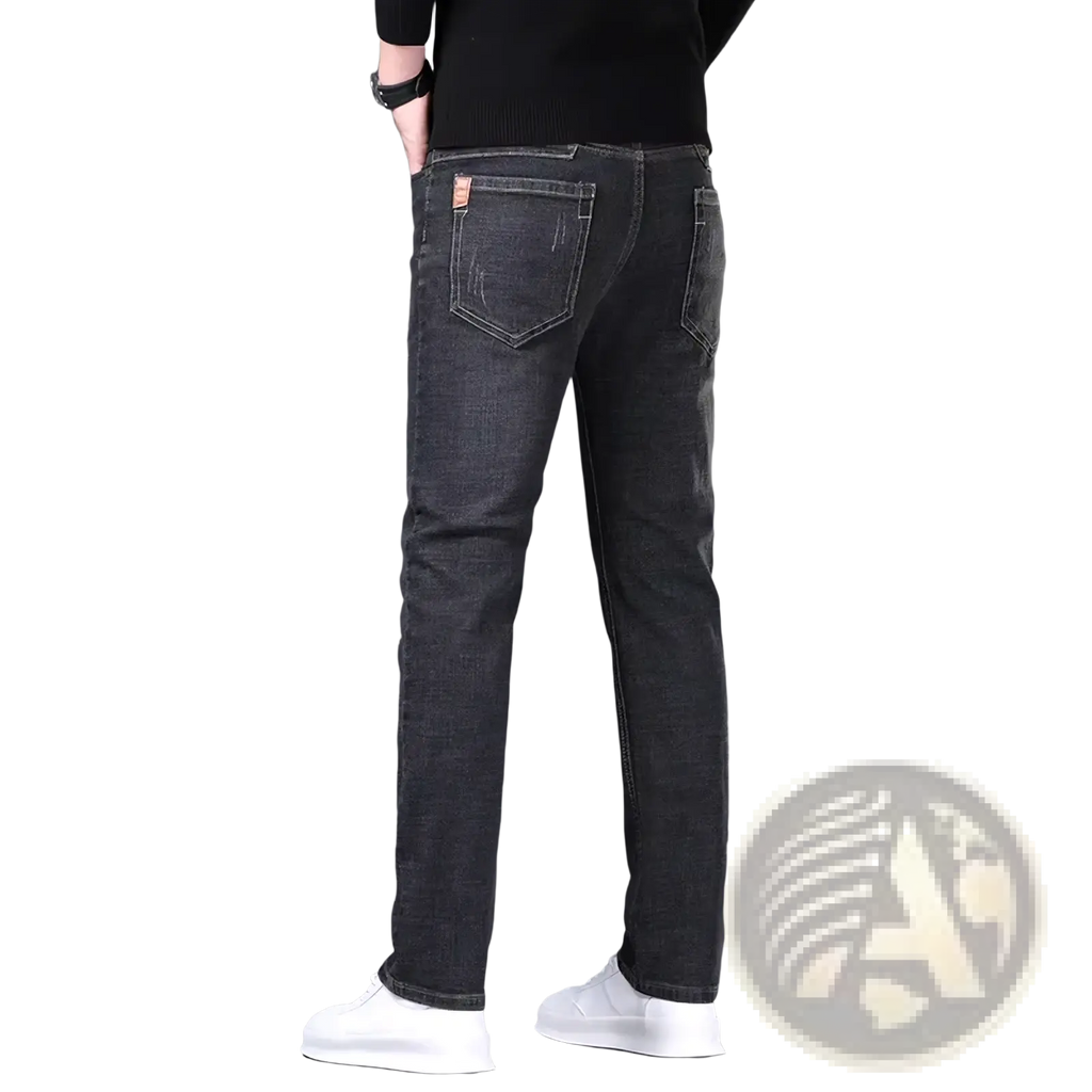 Mens stretch denim jeans slim fit casual pants shown from the back in dark wash with subtle fading on the pockets