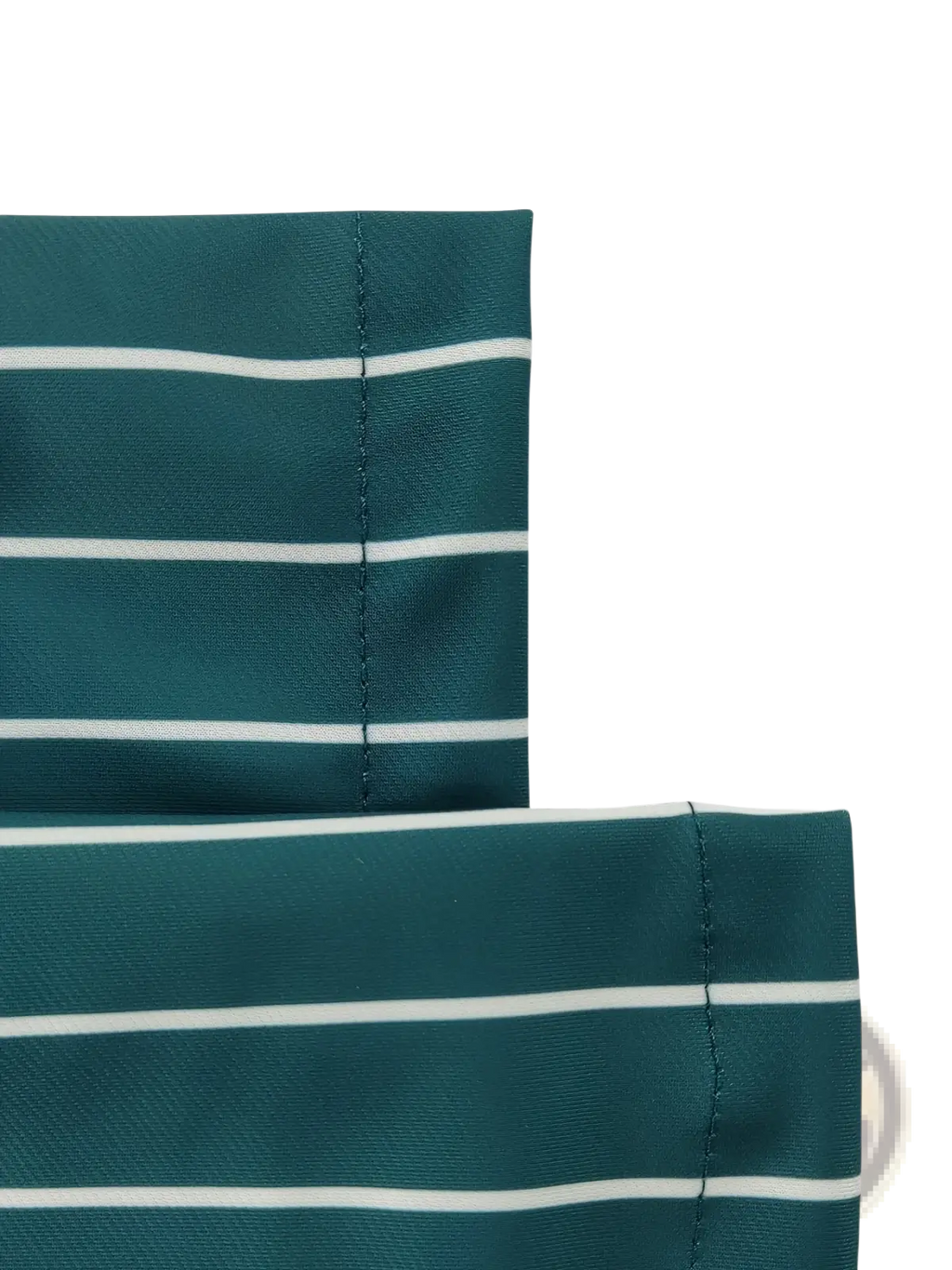 Men’s striped casual dress pants in teal fabric with white horizontal stripes and neat stitching along folded edges