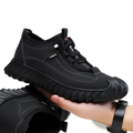 Men’s black suede casual sneaker with chunky textured rubber sole and subtle white stitching details