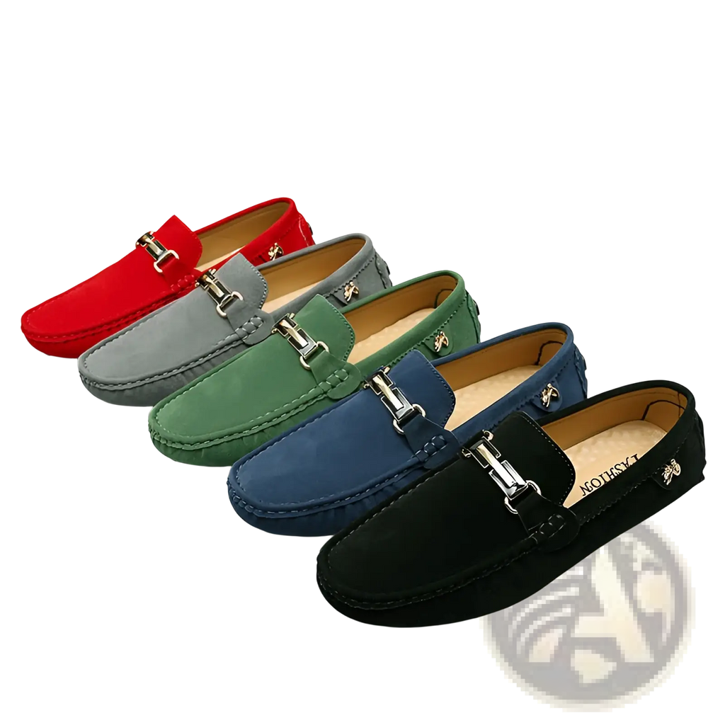 A row of men’s suede horsebit loafers in red gray green blue and black with metallic buckle straps across the vamp