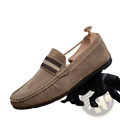 Men’s tan suede loafers with brown and beige striped strap featuring metal buckle and rubber sole