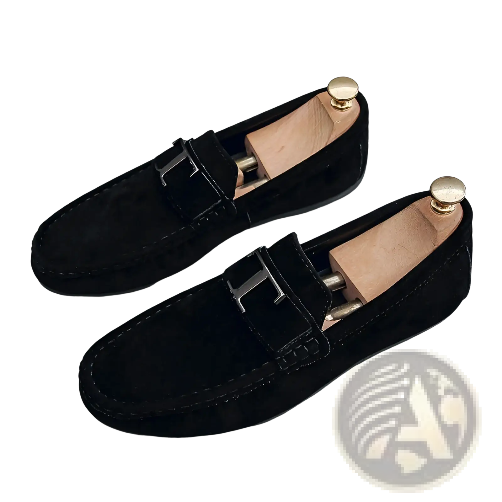 Men’s black suede loafers with a metallic t-shaped buckle and gold-toned heel caps rubber sole visible