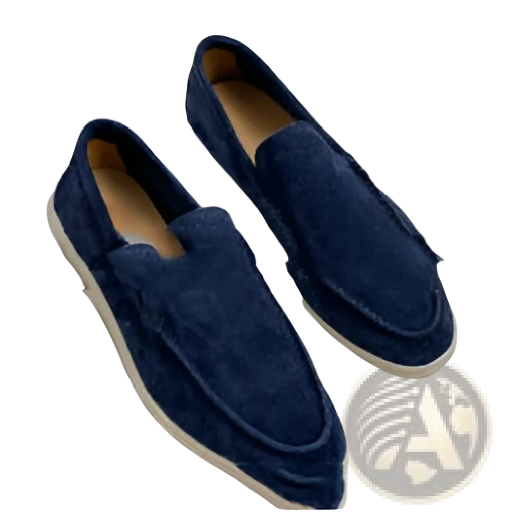 Navy blue suede men’s slip-on loafers with white rubber soles for casual wear visible from the back side