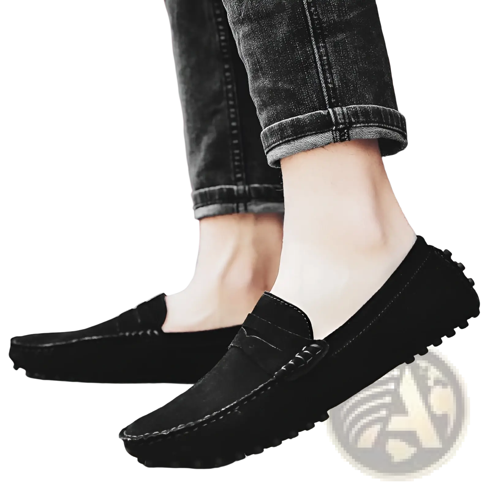 Men’s black suede moccasin loafers with classic design and textured rubber soles displayed from the back side