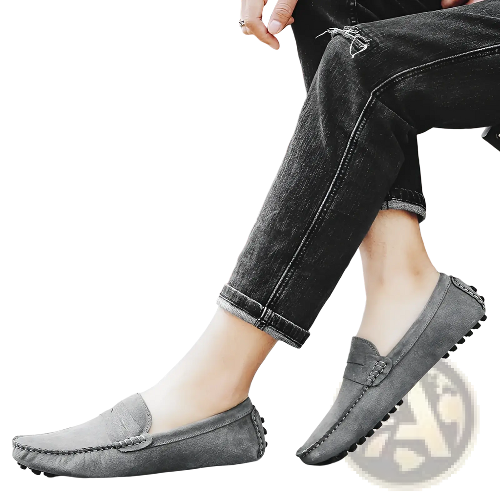 Men’s gray suede moccasin loafers with stitched detailing and rubber sole for casual and formal wear