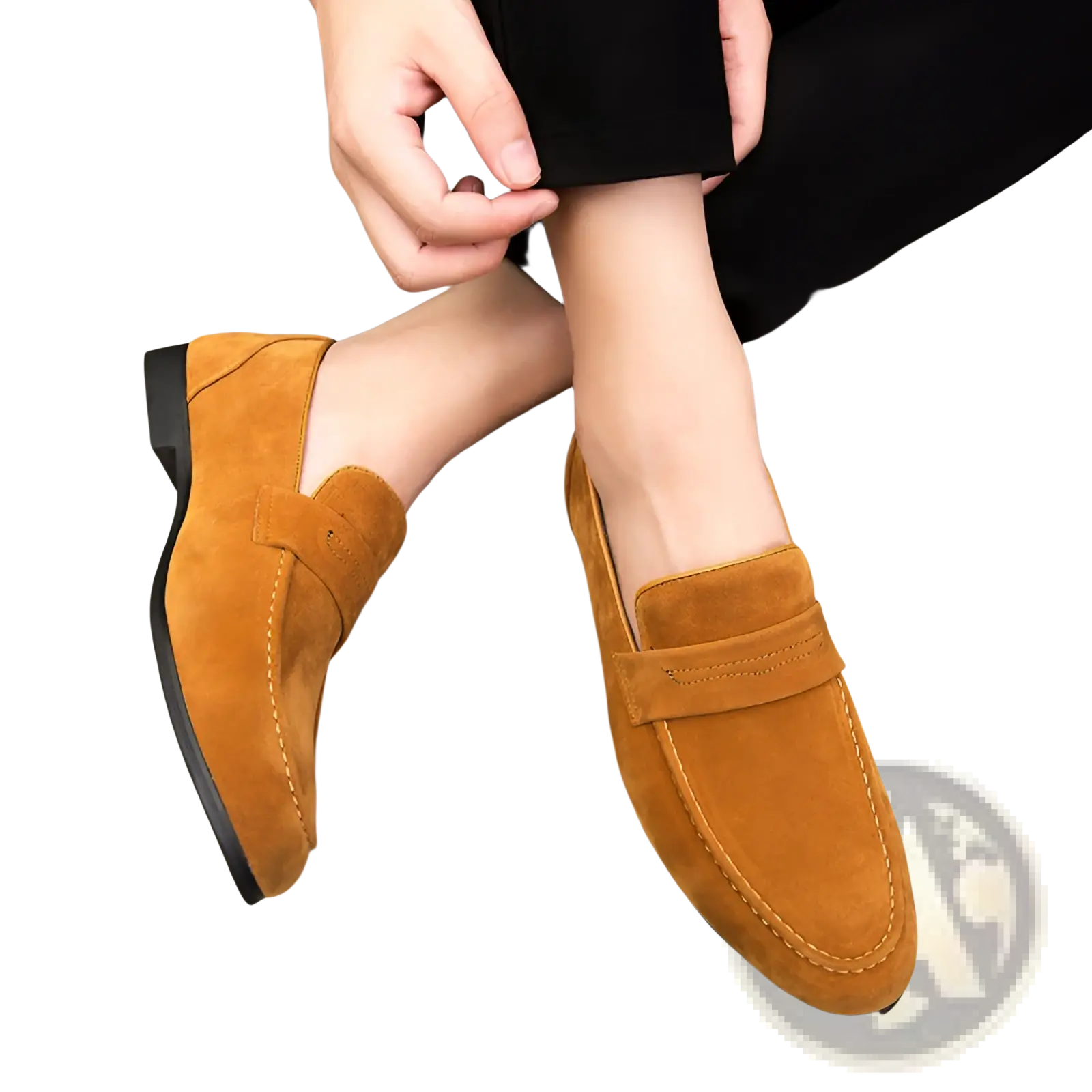 Men’s suede slip-on loafers in tan with black rubber sole and stitched detailing for versatile casual wear