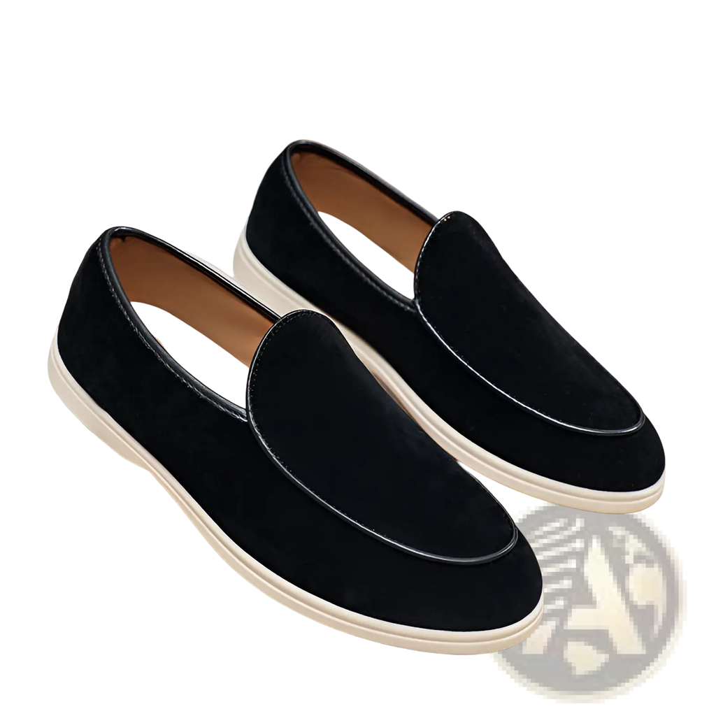 Men’s black suede slip on loafers with white rubber sole and contrasting black stitching for casual wear