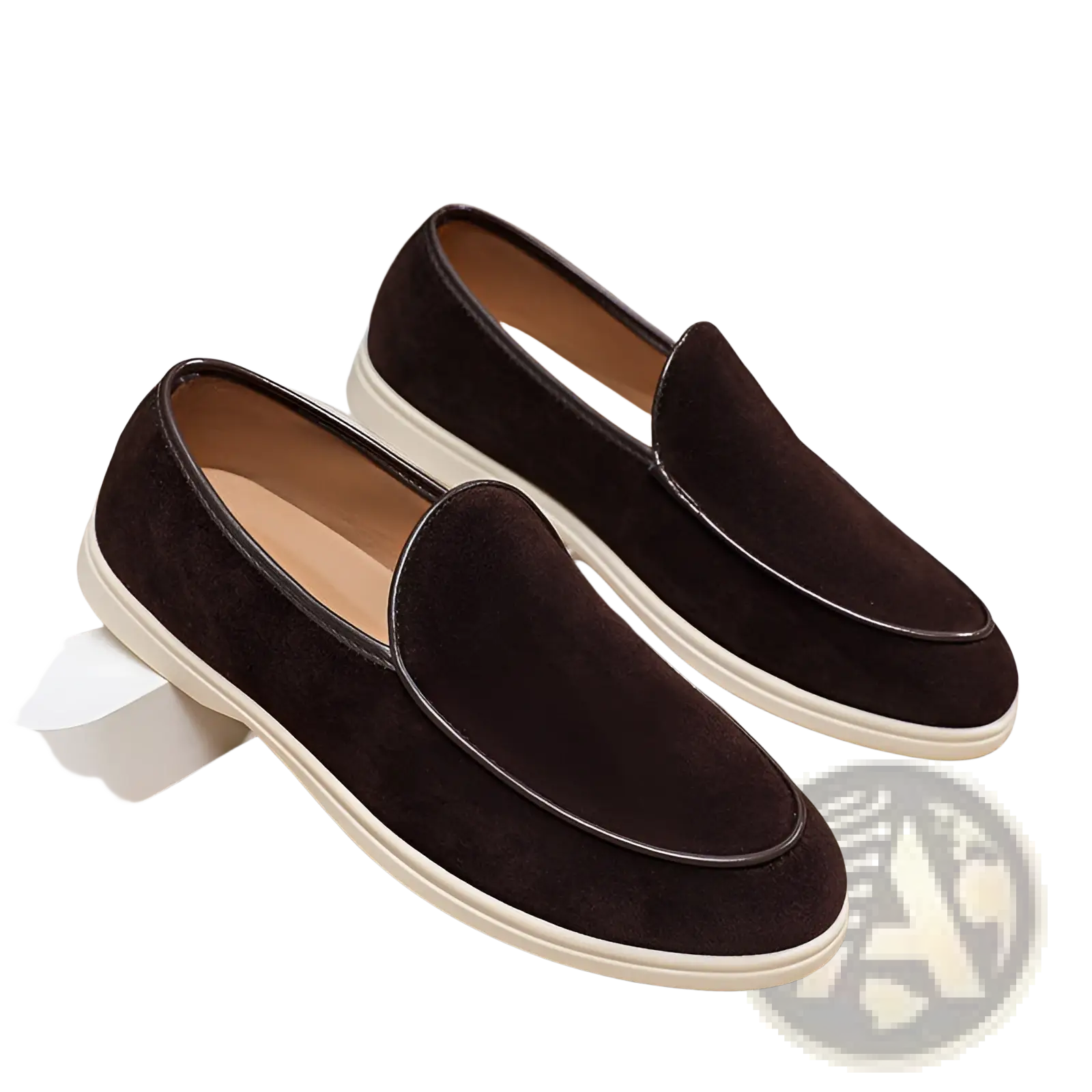 Men’s dark brown suede slip on loafers with cream rubber sole and black stitching along the toe