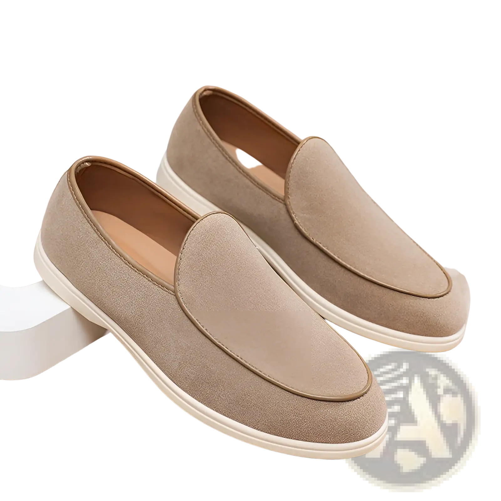 Men’s beige suede slip on loafers with white rubber sole and tan interior lining for comfortable wear