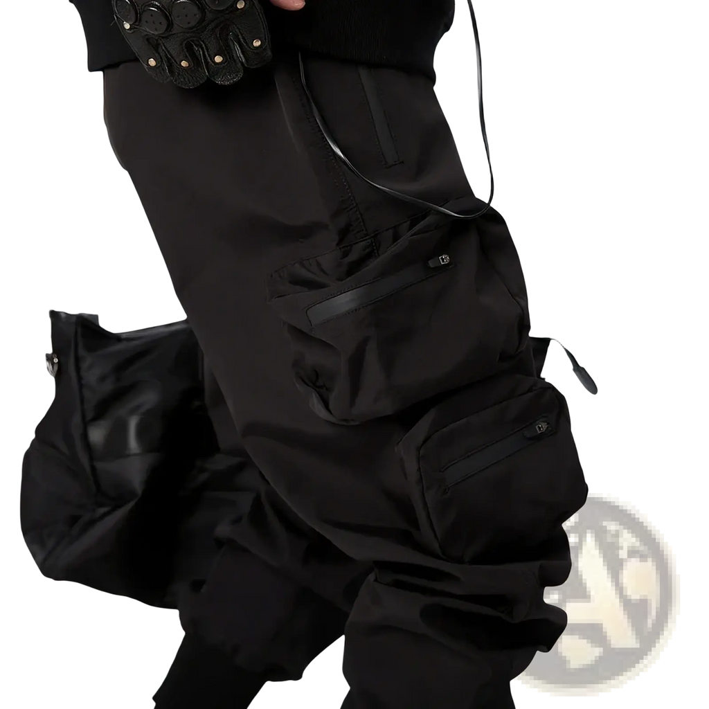 Mens tactical cargo pants utility work joggers in black with multiple zippered pockets and durable slightly shiny fabric