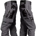 Men’s gray tactical cargo pants with multiple pockets black webbing accents and durable fabric for outdoor use