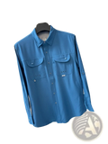 Men’s tactical outdoor long sleeve blue shirt with button-up front, two chest pockets, and subtle brand tag