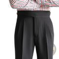 Men’s tailored pleated wool straight leg trousers in black with a tailored fit and gold-toned belt loops