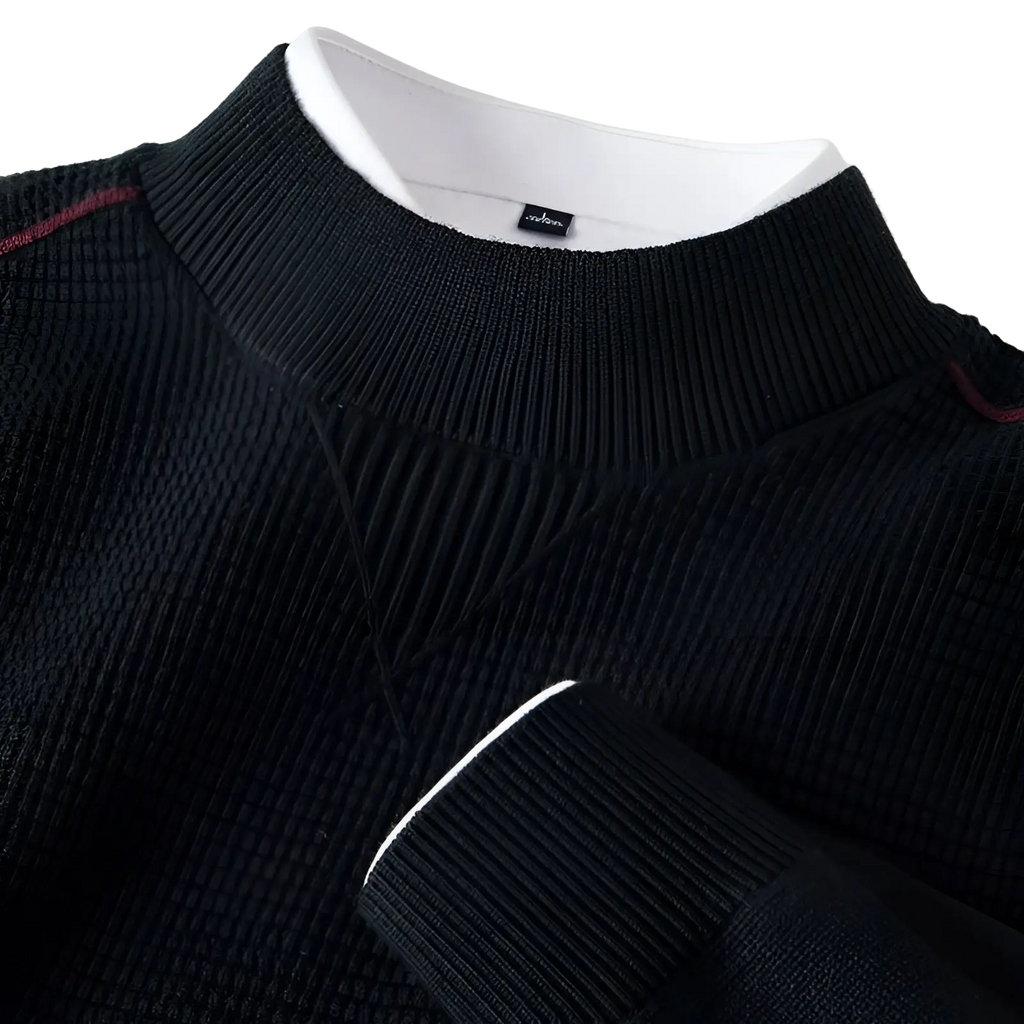 Men’s black ribbed knit sweater with textured body, white inner collar lining, and maroon shoulder seam piping