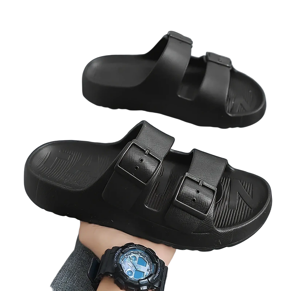 Black rubber men’s thick sole eva slide sandals with two adjustable buckle straps and a textured sole