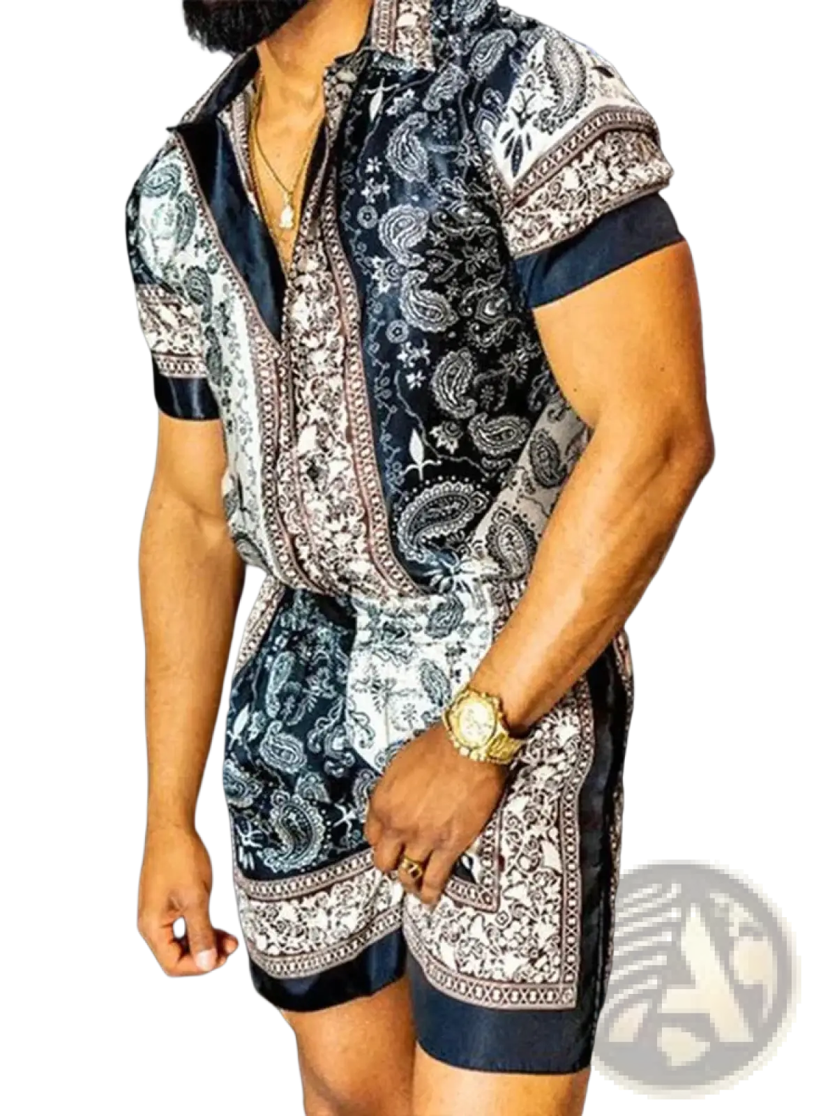 A man wearing a navy blue and white paisley tropical print short sleeve shirt and shorts set with satin trim