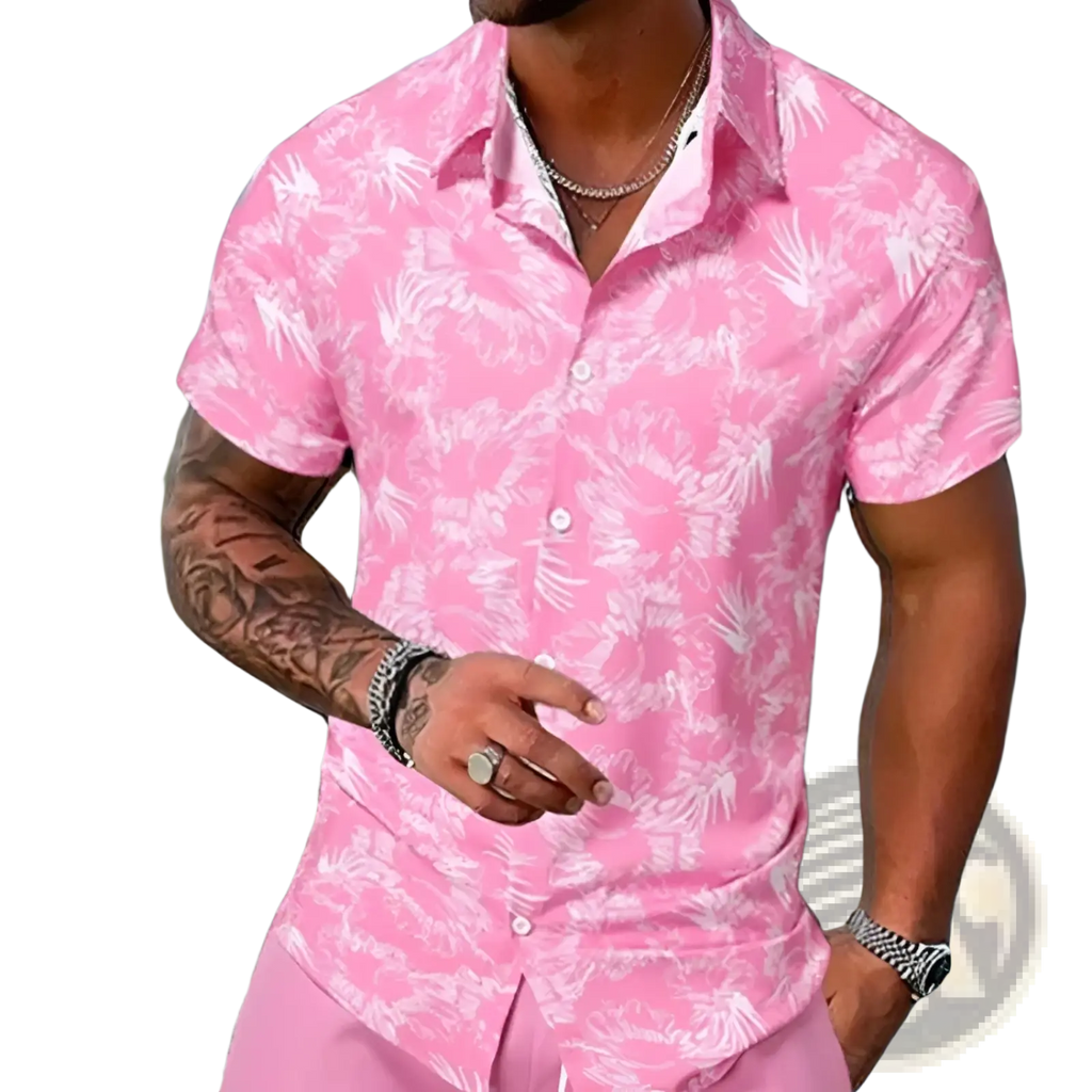 Men’s pink short sleeve button-up shirt with white tropical leaf print in a matching shorts set for warm weather