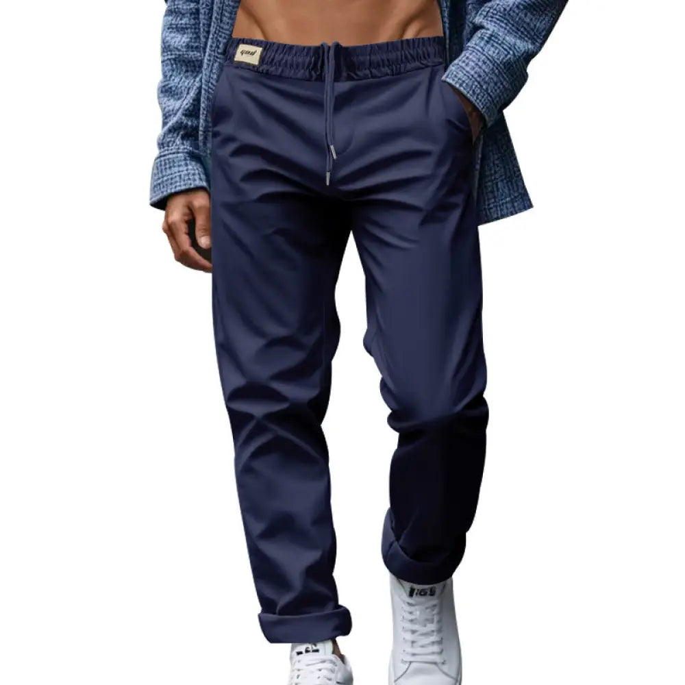 Men’s navy blue lightweight quick dry relaxed jogger pants with drawstring and cuffed hems for casual wear