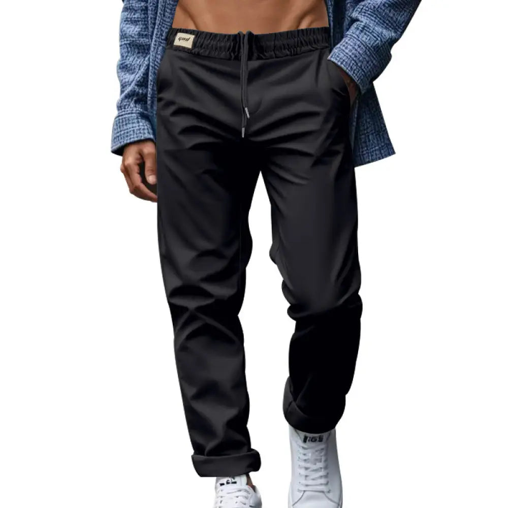 Men’s black lightweight quick dry jogger pants with relaxed fit drawstring waist and cuffed hems