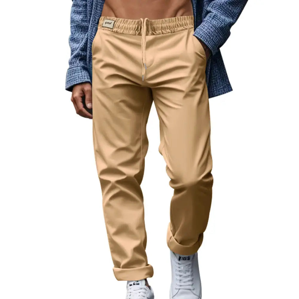 Men’s beige lightweight quick dry chino jogger pants with elastic waistband drawstring relaxed fit and rolled cuffs