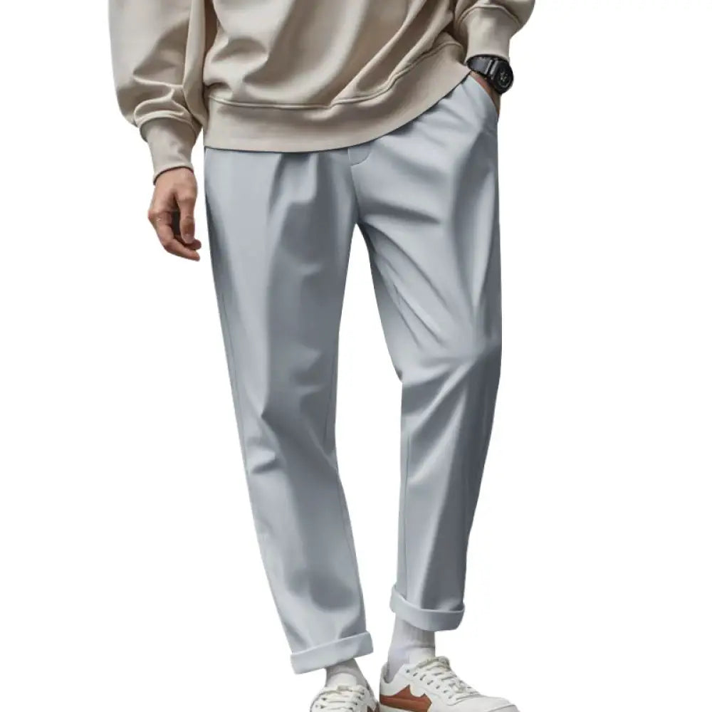Men’s lightweight quick dry relaxed jogger pants in light gray slim-fit chino style with subtle sheen and rolled cuffs