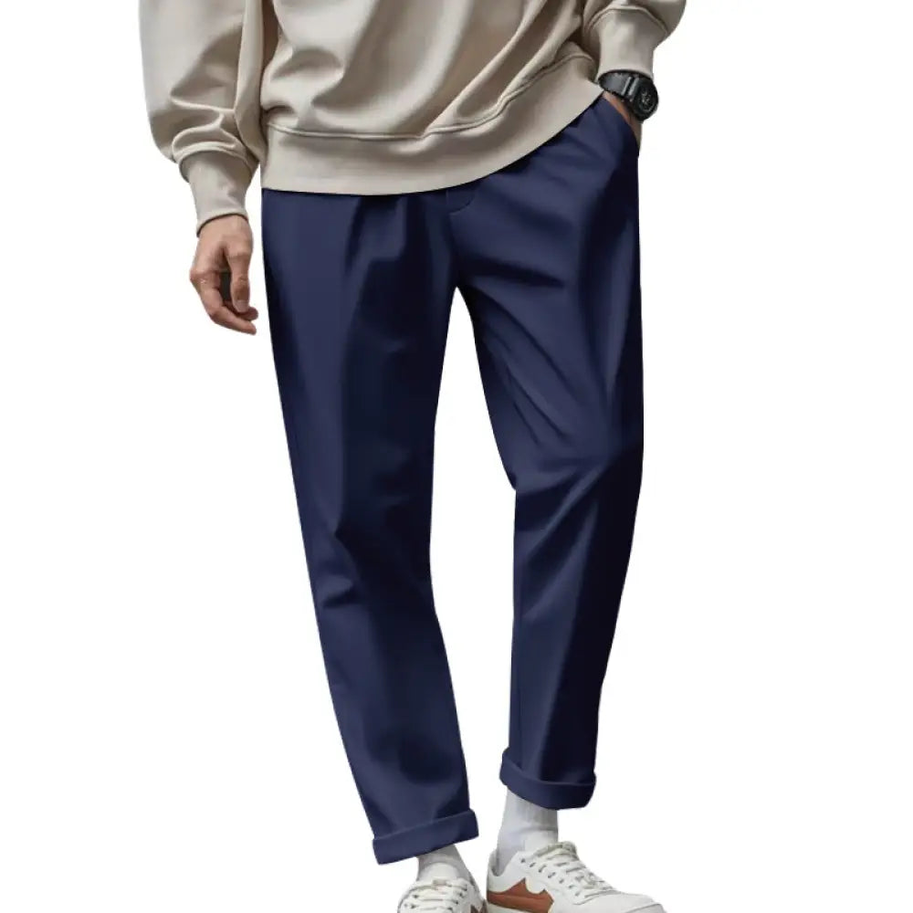 Men’s navy blue lightweight quick dry tapered jogger pants with soft wrinkled fabric and rolled cuffs