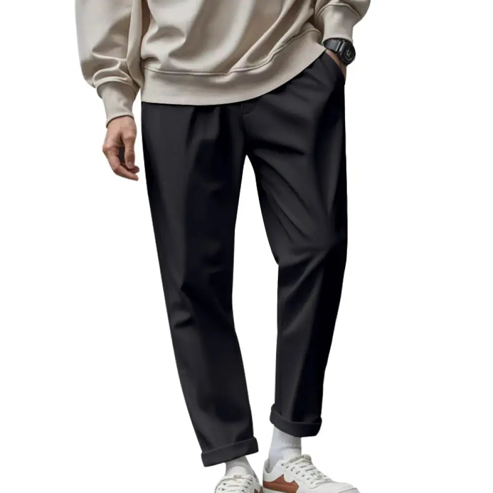 Men’s black lightweight quick dry relaxed jogger pants with tapered fit soft slightly wrinkled fabric and rolled cuffs