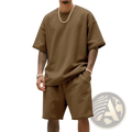 Mens olive green oversized cotton t shirt with relaxed fit and short sleeves from a casual summer two piece set