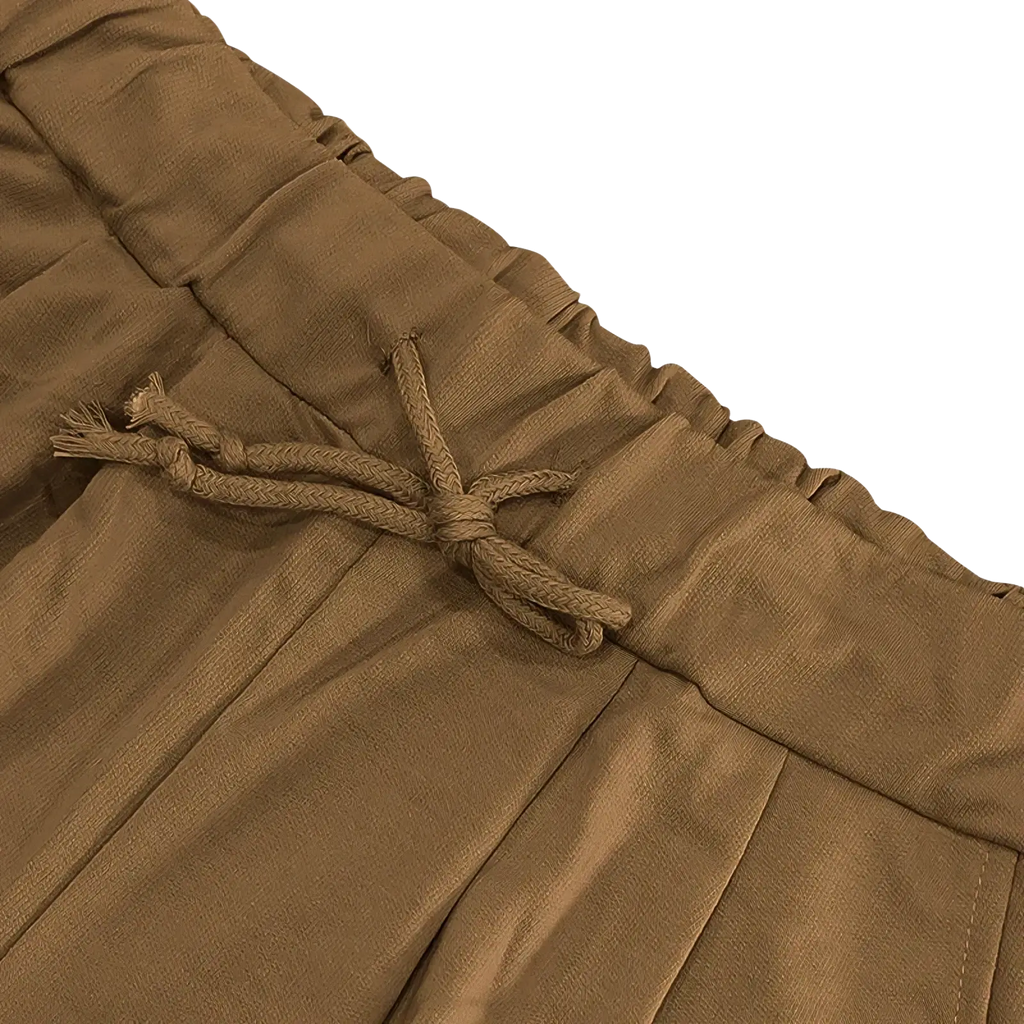 Mens two piece summer outfit featuring tan pleated pants with a drawstring waistband for casual wear