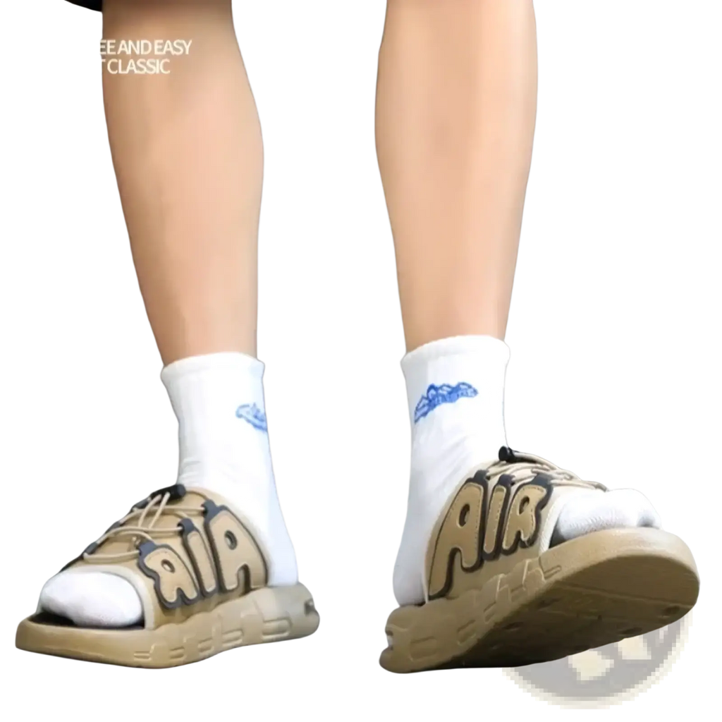 Men’s ultra soft anti slip slide sandals in tan and beige with dark brown bold air lettering and athletic design