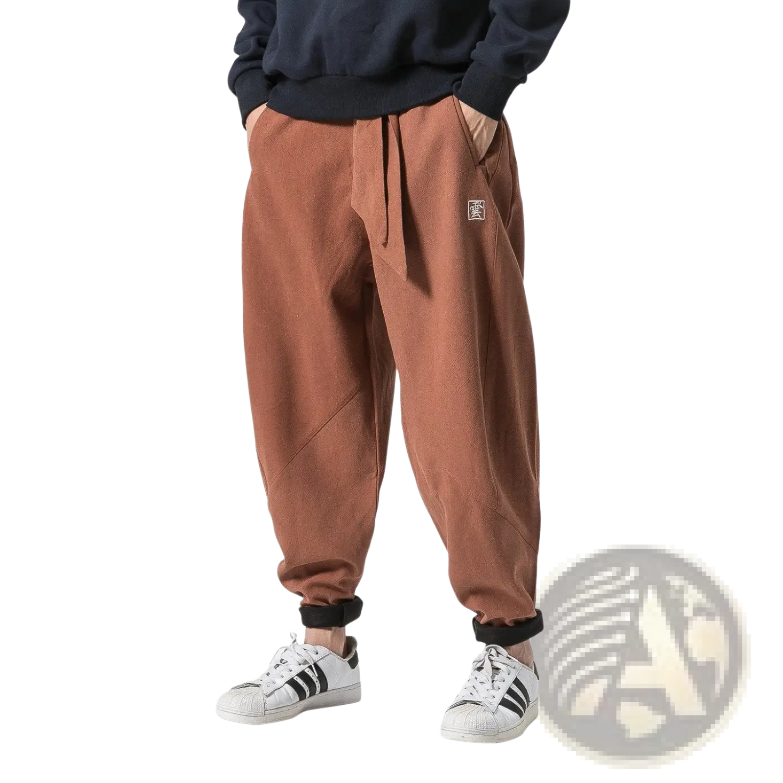 Men’s brown velvet lined relaxed fit cargo joggers with black cuffs and embroidered patch on the thigh