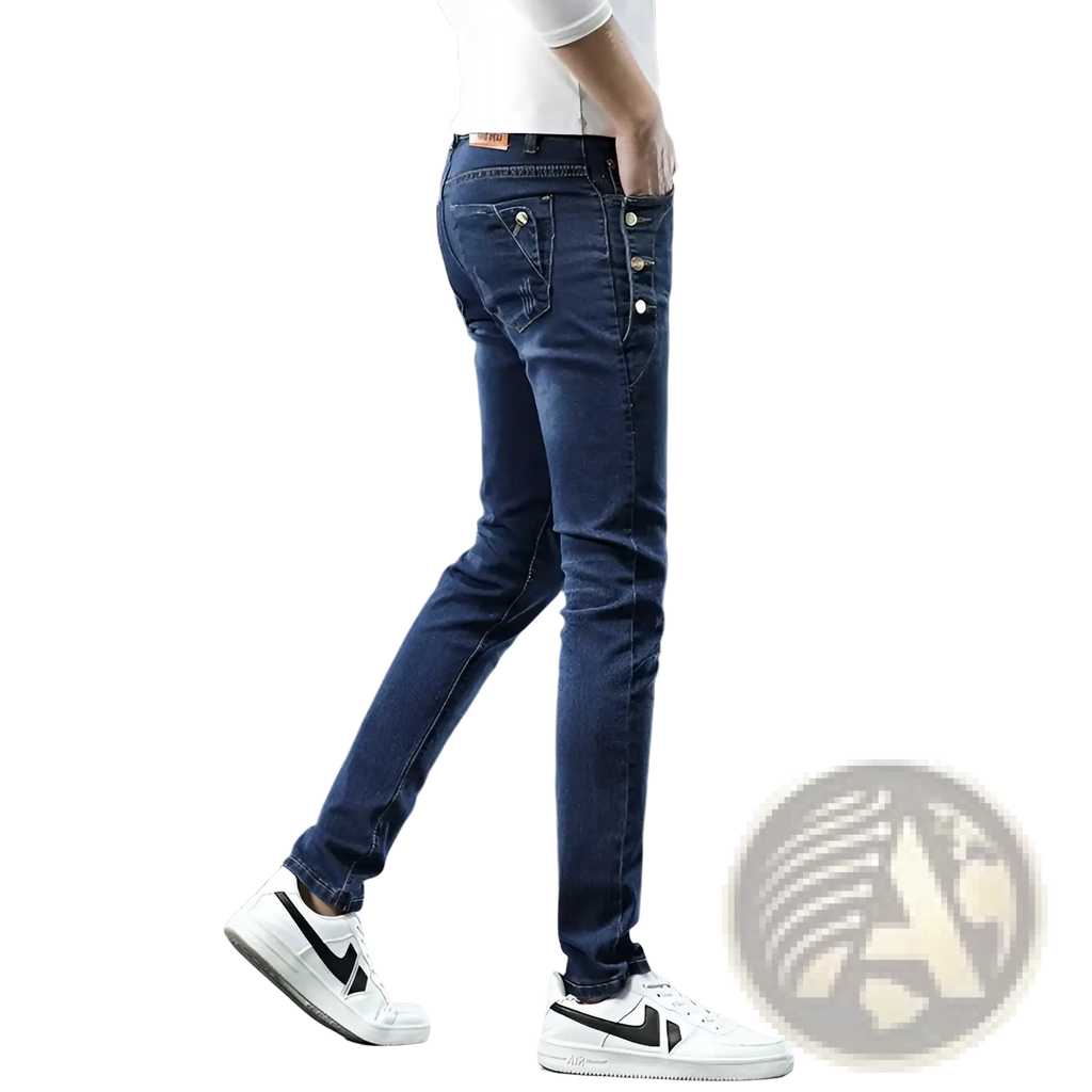 Dark blue slim fit denim jeans showing back side with button closures on the pocket in vintage stretch grey wash
