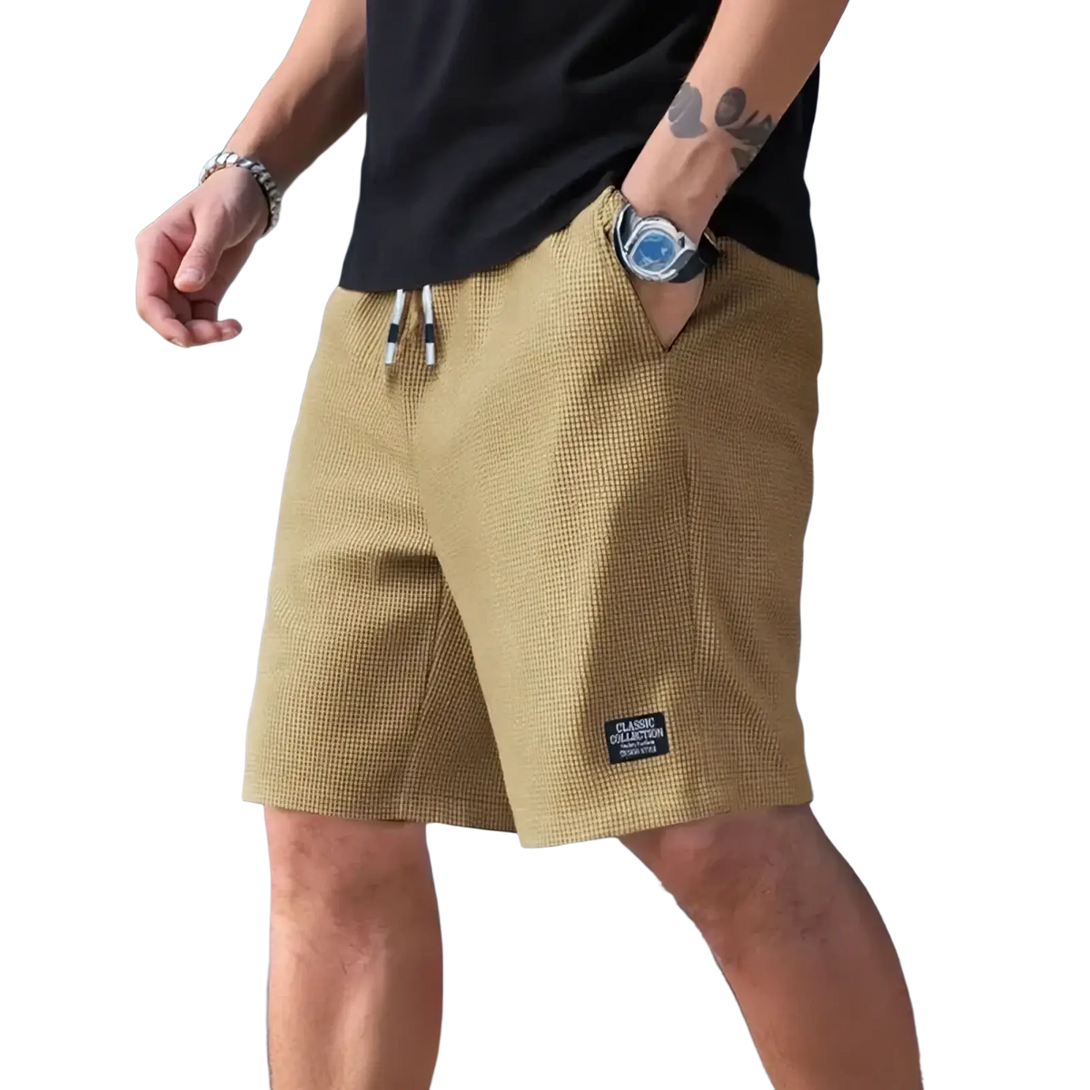 Men’s waffle knit casual beach shorts in beige with black and white drawstrings and classic collection patch on the leg
