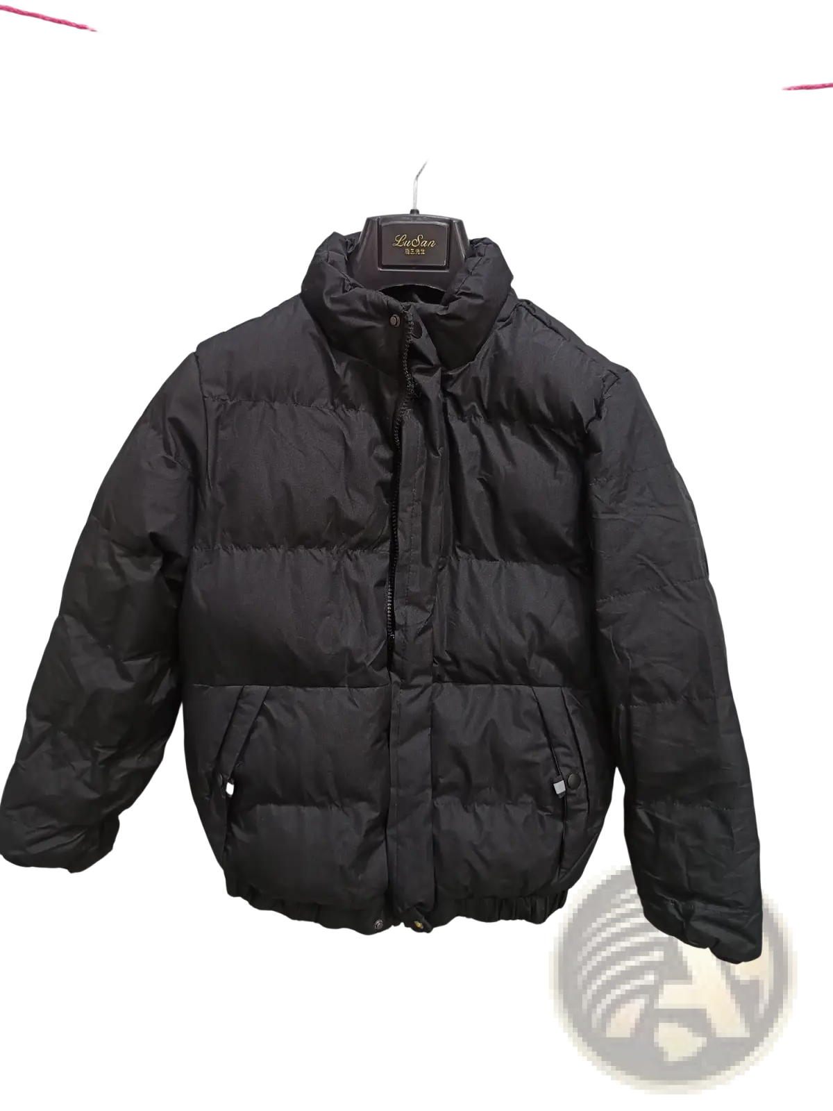 Black men’s warm padded down jacket with high collar and front zipper hanging on a hanger