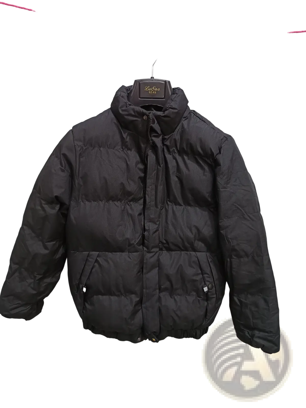 Black men’s warm padded down jacket with high collar and front zipper hanging on a hanger