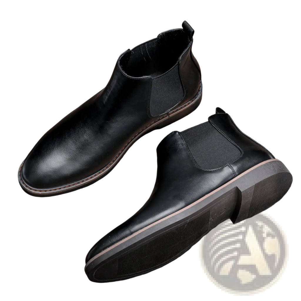 Men’s black waterproof leather Chelsea boots with elastic side panels and tan sole featuring a matte finish