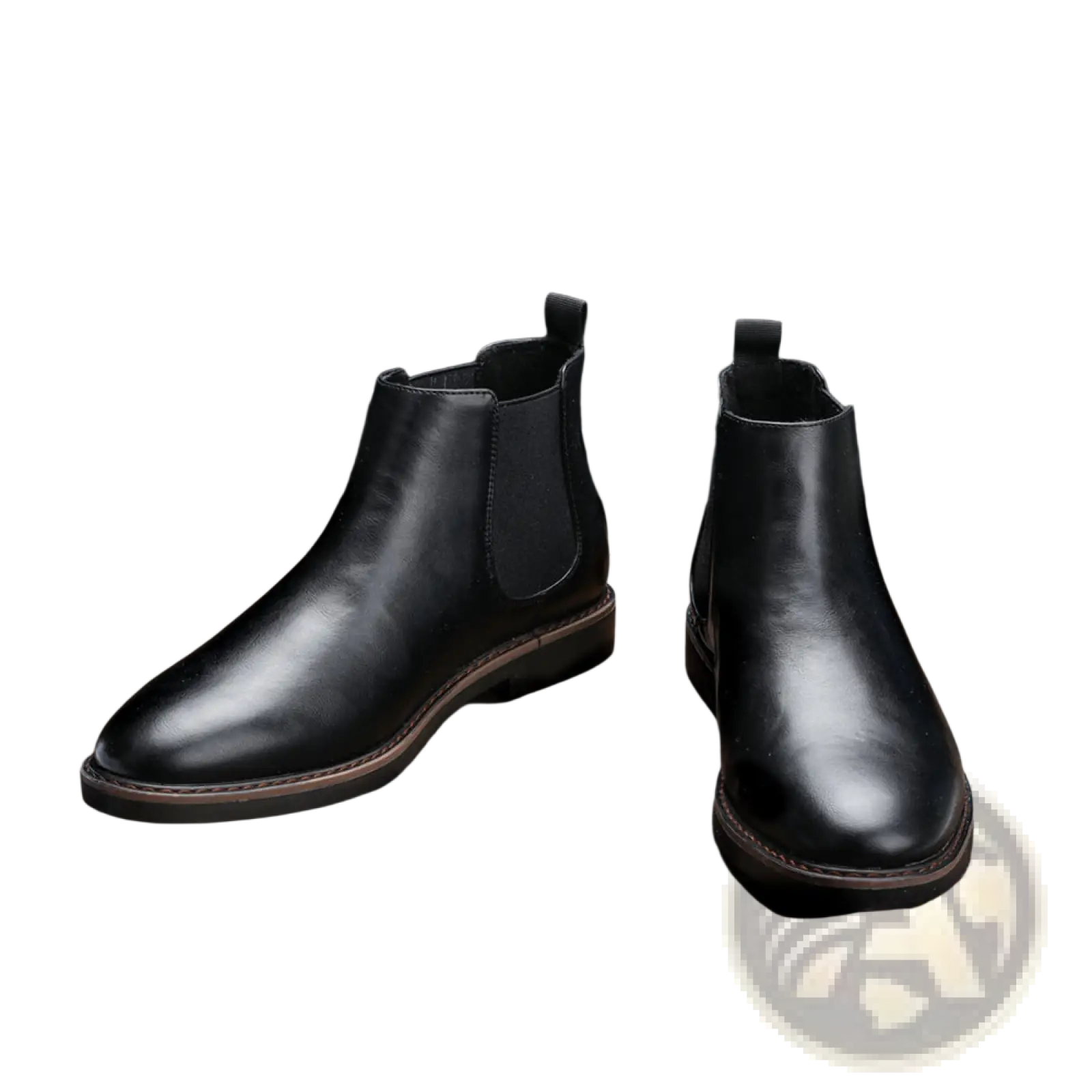 Men’s waterproof black leather chelsea boots with smooth polished finish and contrasting tan soles
