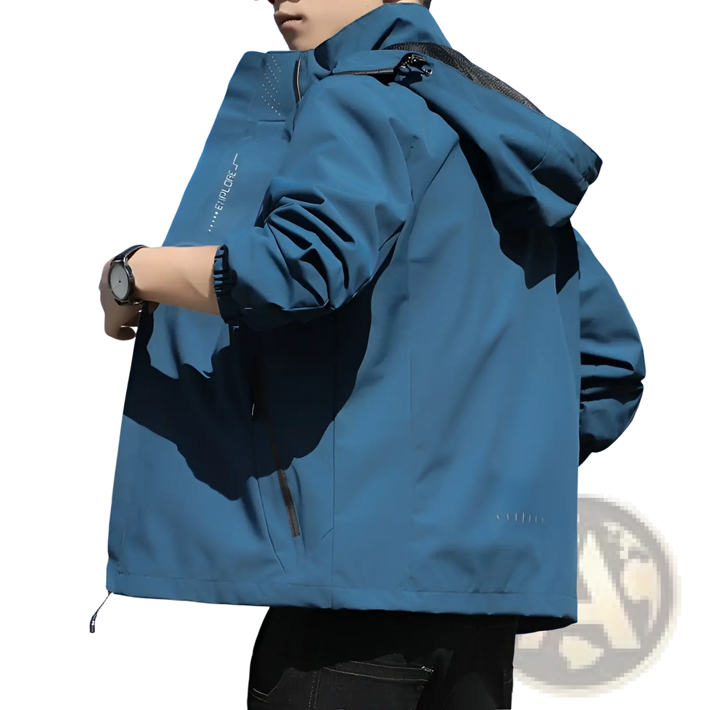 Men’s blue waterproof sports jacket with hood and zipper details designed for outdoor activities