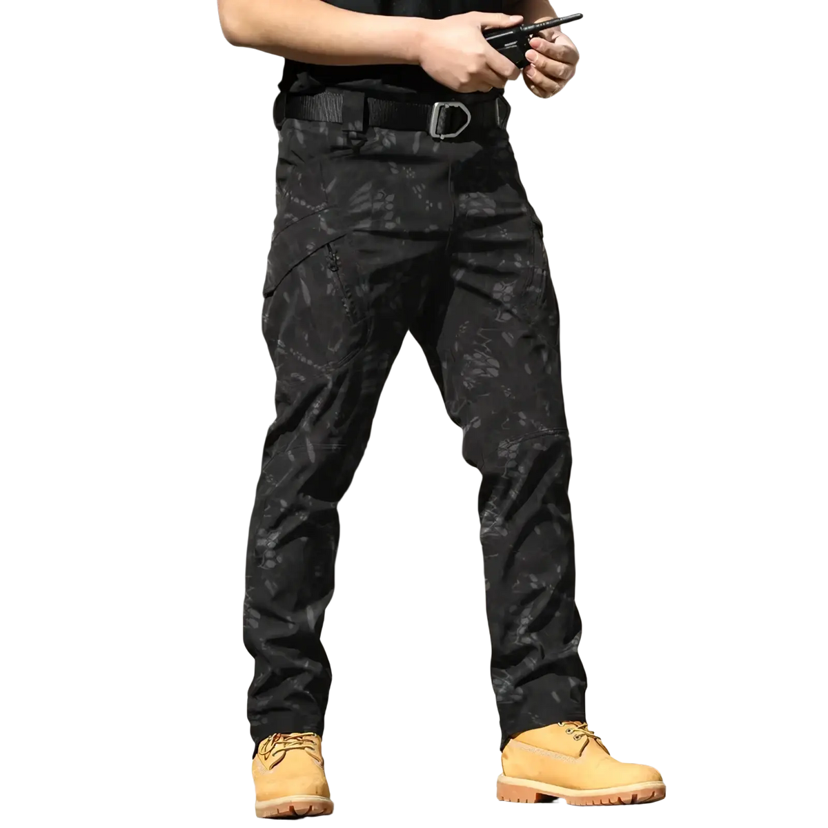 Men’s waterproof tactical cargo pants in black with subtle gray camouflage and multiple cargo pockets